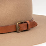 Ninakuru long brim wool hat with leather band and buckle.