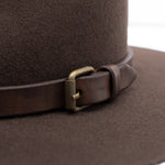 Ninakuru long brim wool hat with leather band and buckle.