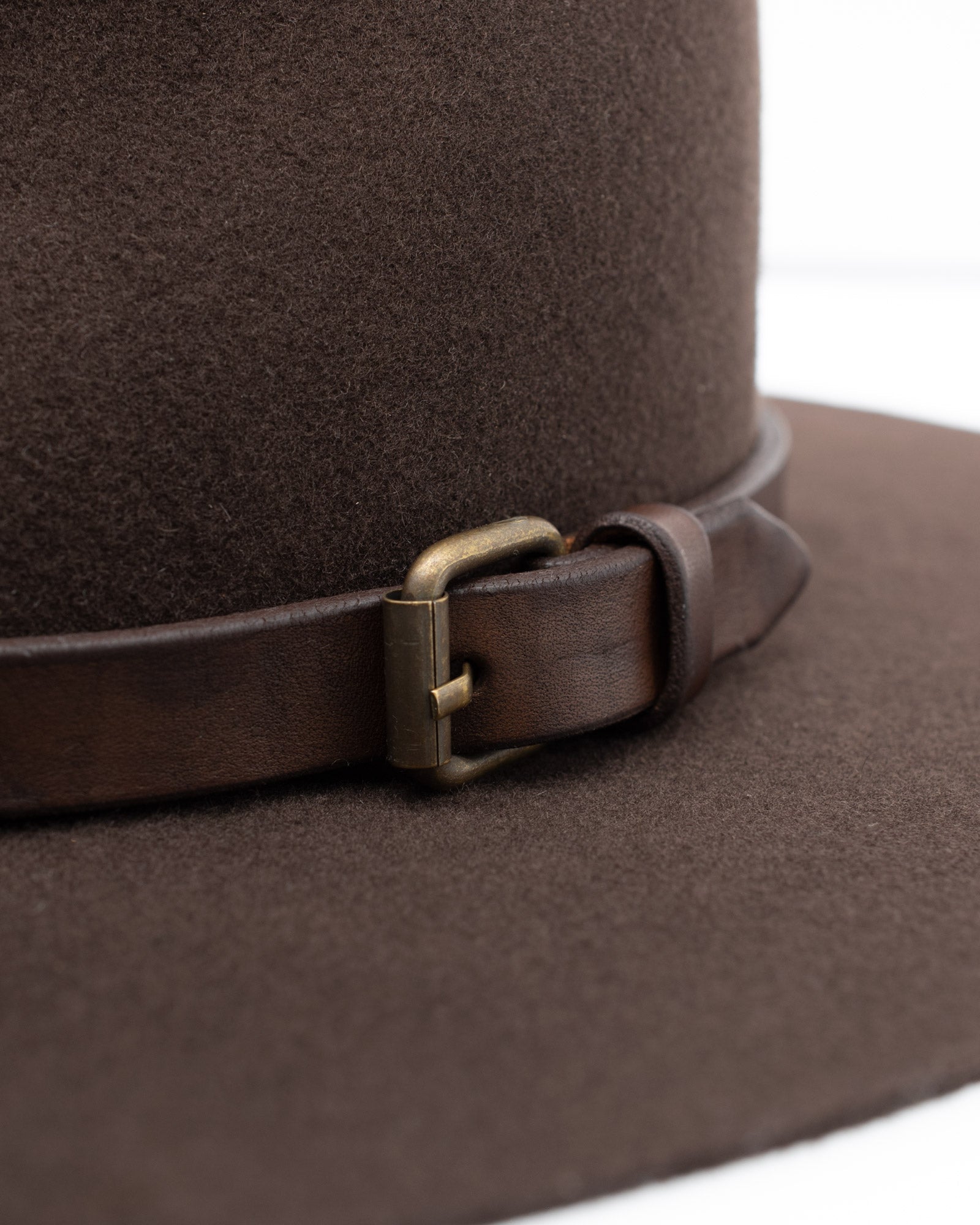 Ninakuru long brim wool hat with leather band and buckle.