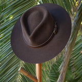 Ninakuru long brim wool hat with leather band and buckle.