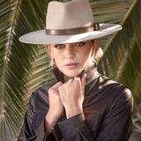 Ninakuru long brim wool hat with leather band and buckle.