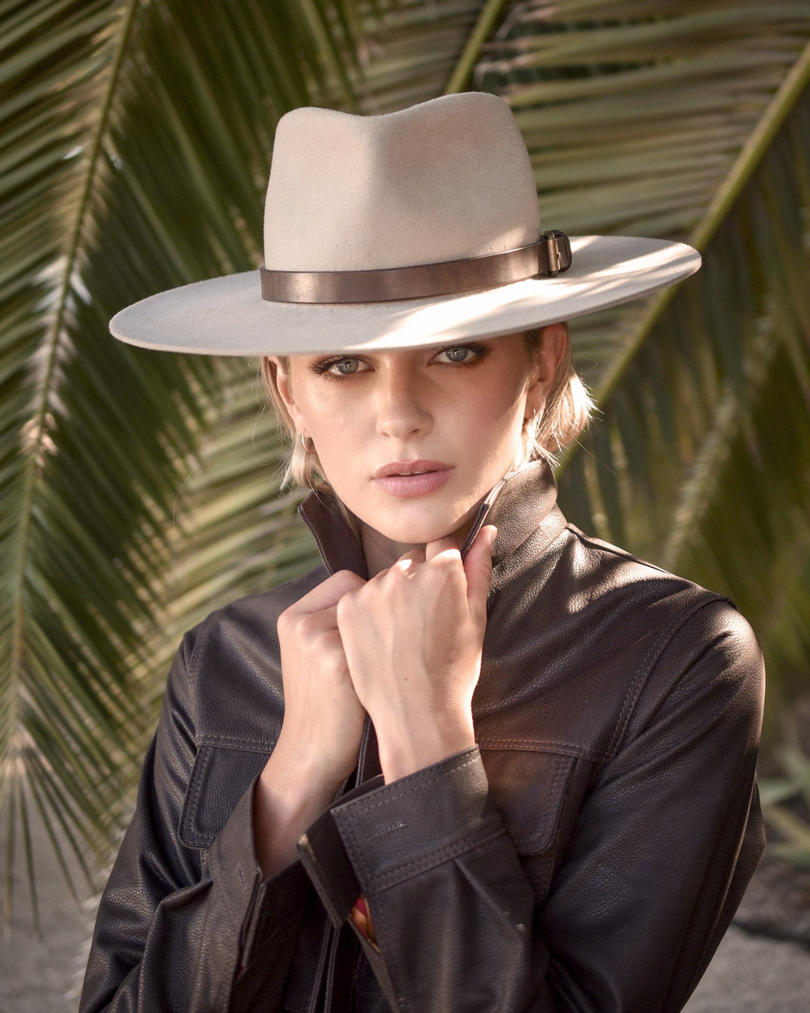 Ninakuru long brim wool hat with leather band and buckle.