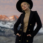 Ninakuru long brim wool hat with black leather band and eyelets. Leather interior band.