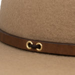 Ninakuru long brim wool hat with brown leather band and eyelets. Leather interior band.