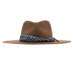 Ninakuru wool hat with cotton wrap band and leather lace.