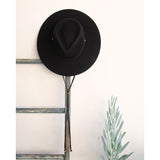 Ninakuru wool hat with leather band, bronze and stampede strap.