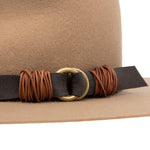 Ninakuru wool hat with vegan band and brass loops.