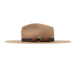 Ninakuru wool hat with vegan band and brass loops.