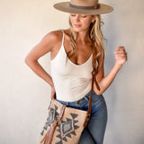 Ninakuru wool hat with vegan band and brass loops.