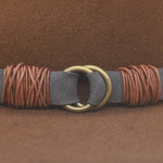 Ninakuru wool hat with vegan band and brass loops.