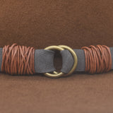 Ninakuru wool hat with vegan band and brass loops.