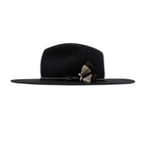 Ninakuru long brim wool hat with leather band and horsehair tassels.