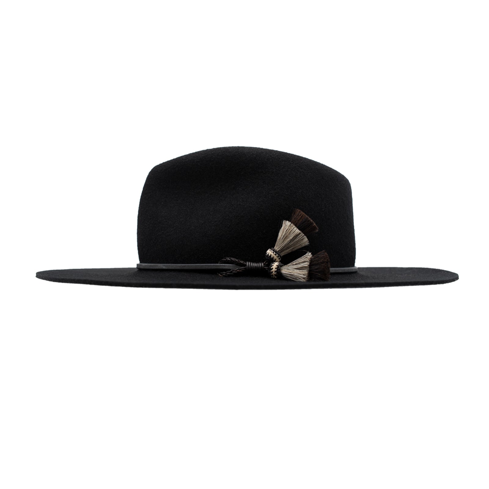 Ninakuru long brim wool hat with leather band and horsehair tassels.