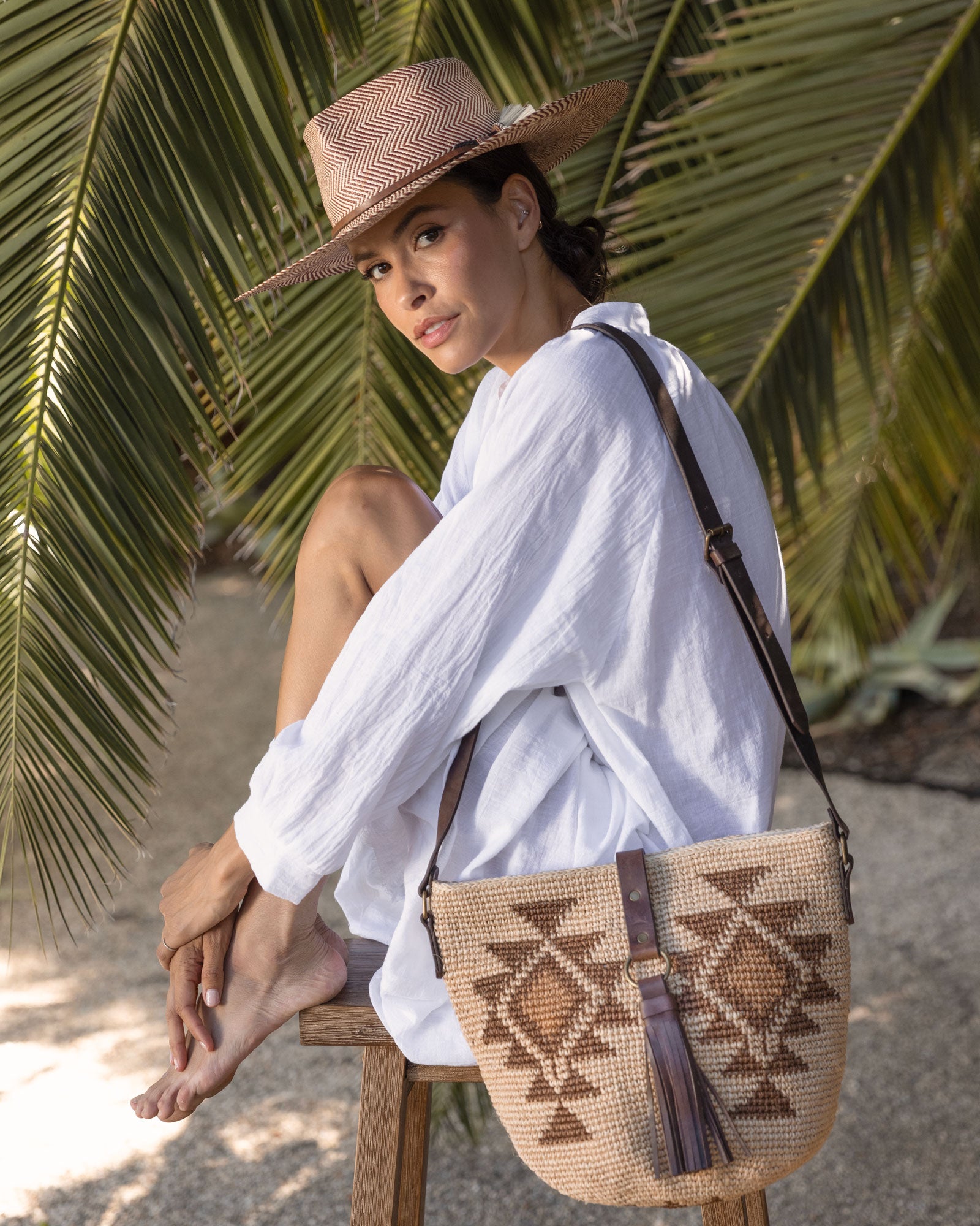 Ninakuru Panama hat with leather and horsehair, paired with agave straw bag.