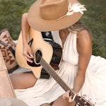 Ninakuru wool hat with game feathers and turquoise.