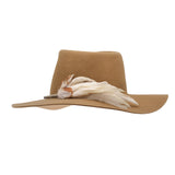 Ninakuru wool hat with game feathers and turquoise.