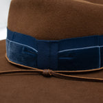 Ninakuru wool felt hat with velvet and leather.