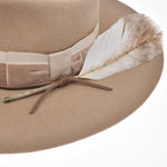 Ninakuru wool felt hat with velvet and leather.