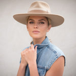 Ninakuru wool felt hat with velvet and leather.