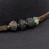 Ninakuru wool felt hat with leather and labradorite.