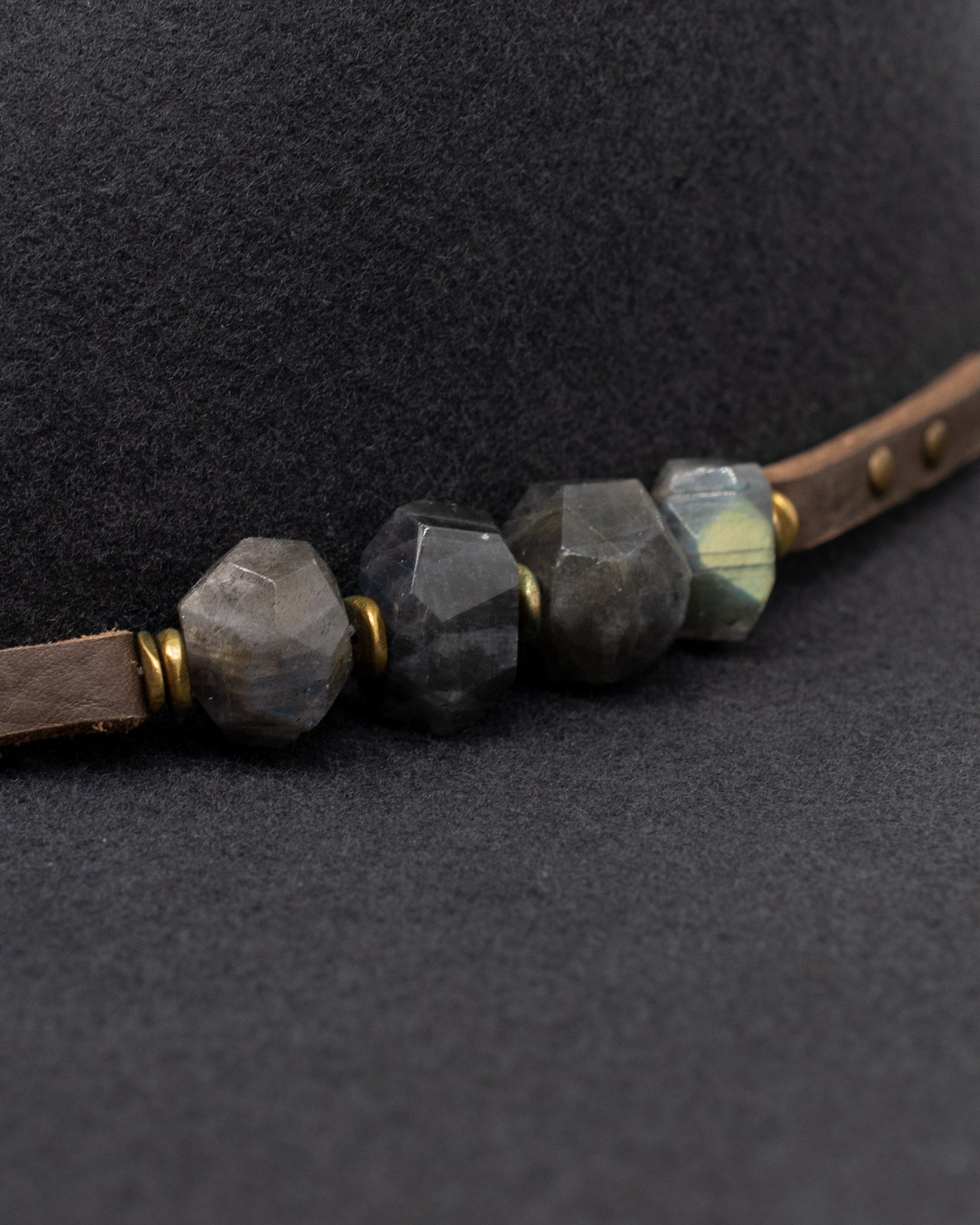 Ninakuru wool felt hat with leather and labradorite.