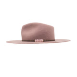 Ninakuru wool felt hat with leather and pink quartz.