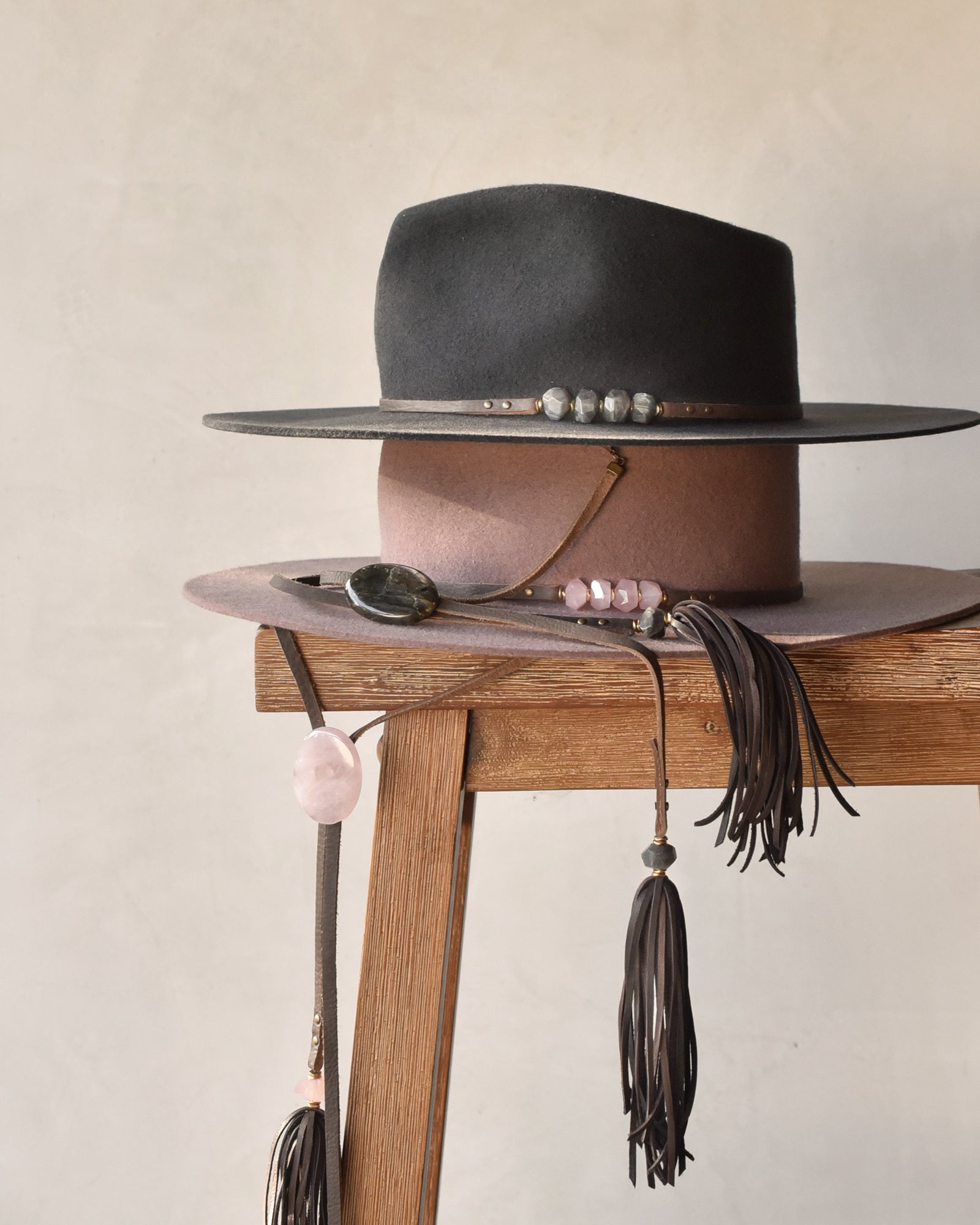 Ninakuru wool felt hat with leather and pink quartz.