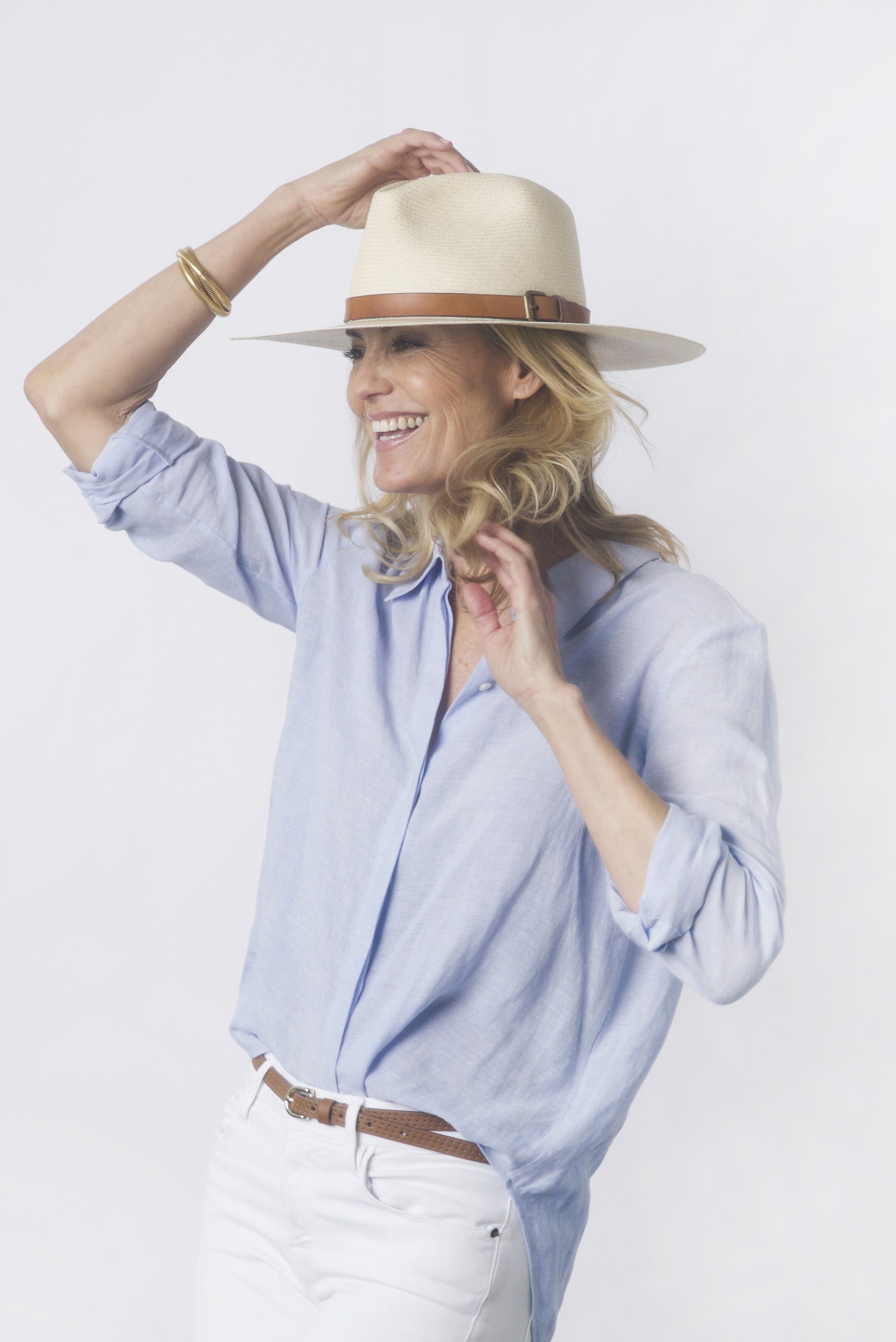 Ninakuru long brim Panama hat with leather band and buckle.