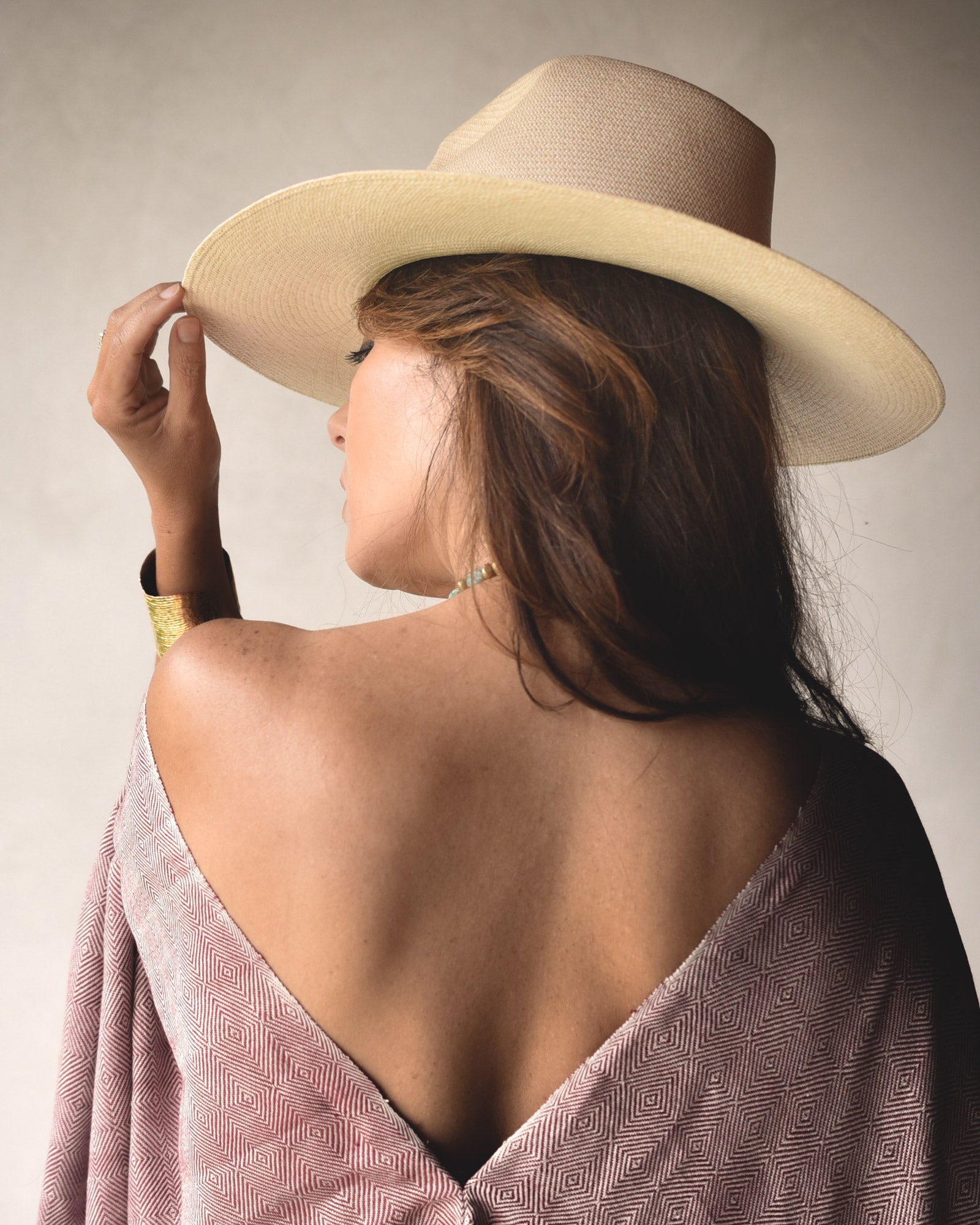 Ninakuru long brim Panama hat with leather band and buckle.