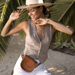Ninakuru long brim Panama hat with leather band and buckle.