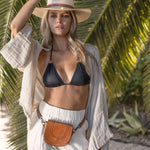 Ninakuru long brim Panama hat with leather band and buckle.