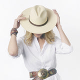 Ninakuru long brim Panama hat with leather embellished band, line stitch.