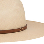 Ninakuru long brim Panama hat with leather band and brass eyelets.