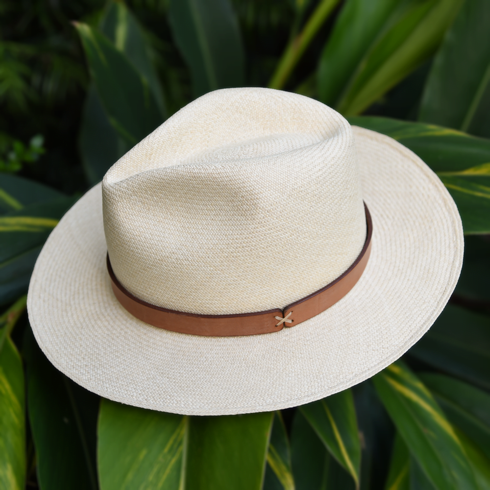 Ninakuru long brim Panama hat with leather band and X stitch. Cotton interior band.