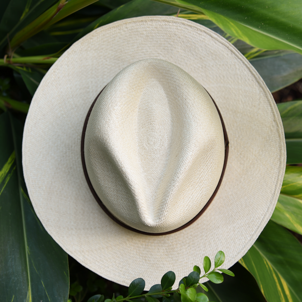 Ninakuru long brim Panama hat with leather band and X stitch. Cotton interior band.