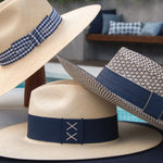 Ninakuru long brim Panama hat with grosgrain ribbon with stitched loop.