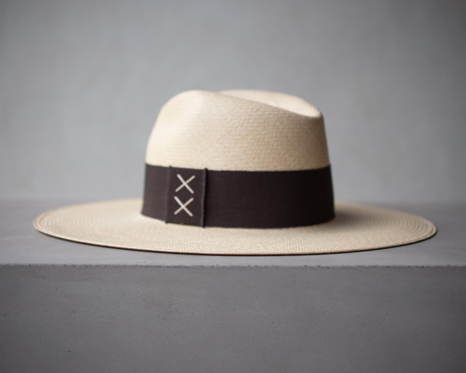 Ninakuru long brim Panama hat with grosgrain ribbon, stitched loop.