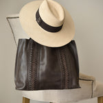 Ninakuru Panama hat and leather bag.