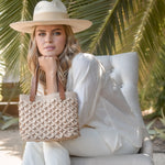Ninakuru long brim Panama hat with grosgrain ribbon, stitched loop.