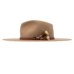 Ninakuru long brim wool hat with leather band and horsehair tassels.