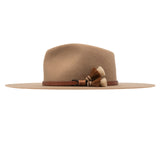 Ninakuru long brim wool hat with leather band and horsehair tassels.