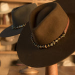 Ninakuru long brim wool hat with leather band, turquoise nuggets. Leather interior band.