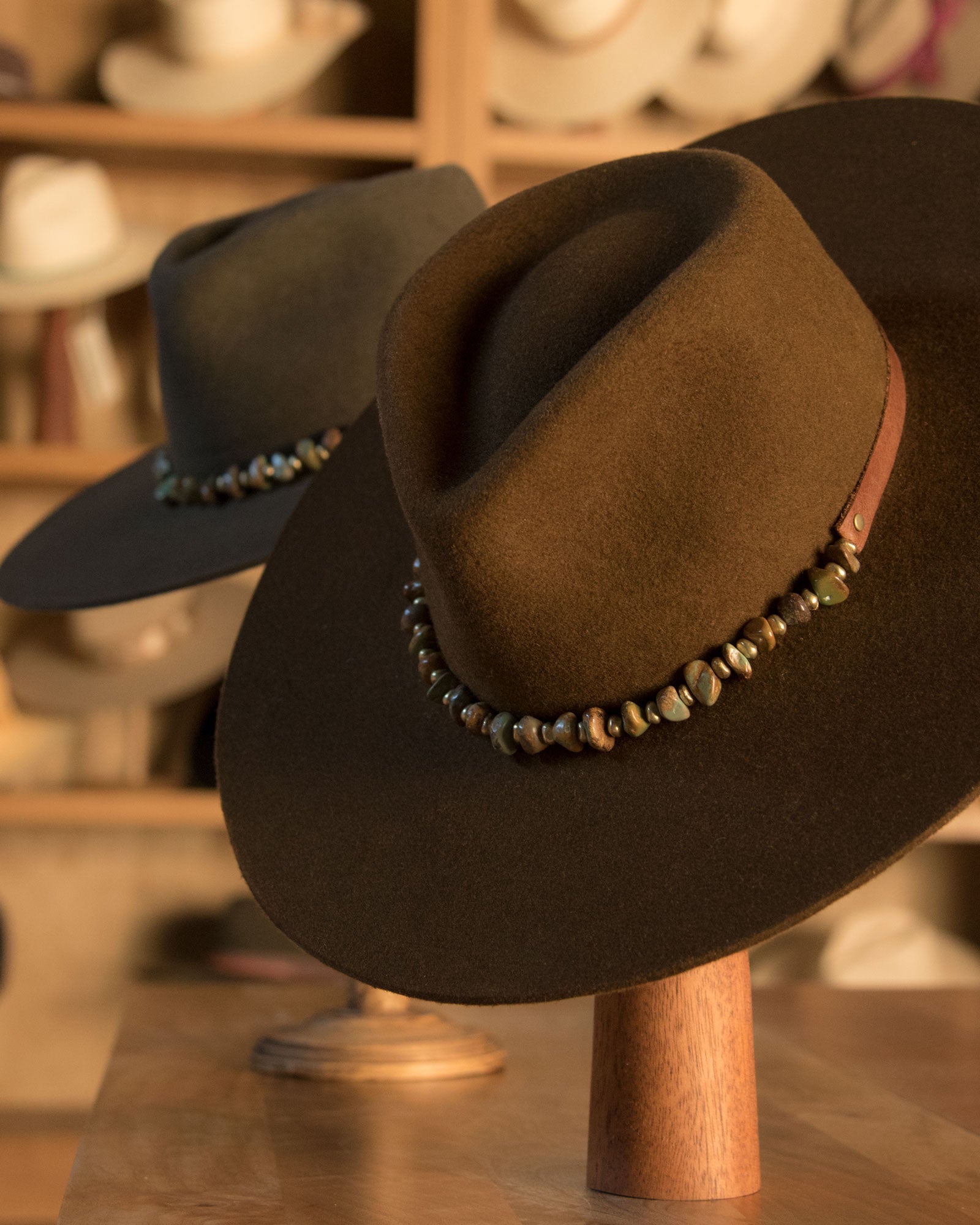 Ninakuru long brim wool hat with leather band, turquoise nuggets. Leather interior band.