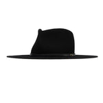 Ninakuru long brim wool hat with brown leather band and eyelets. Leather interior band.