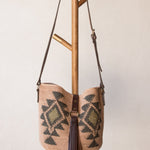 Agave straw handwoven bag with leather straps.