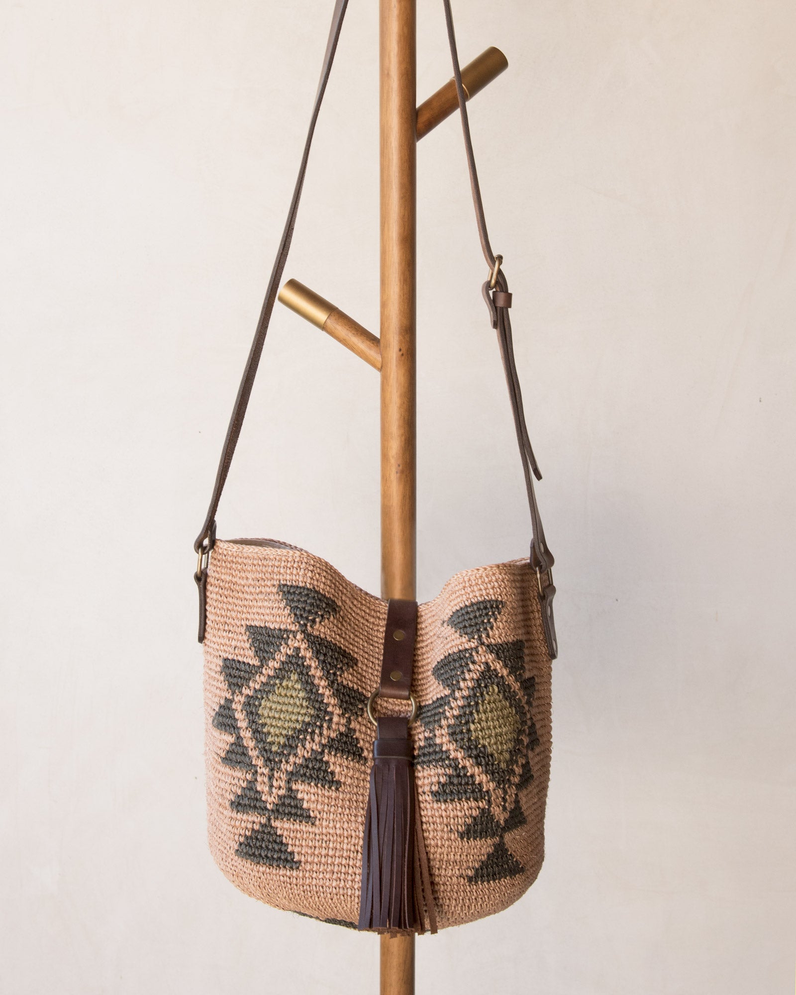 Agave straw handwoven bag with leather straps.