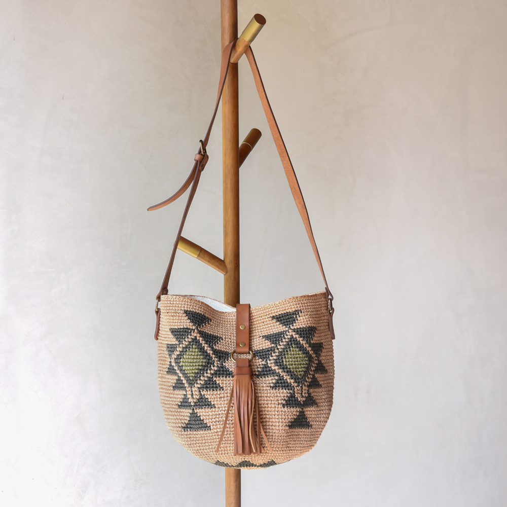 Agave straw handwoven bag with leather straps.