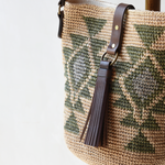 Agave straw handwoven bag with leather straps.