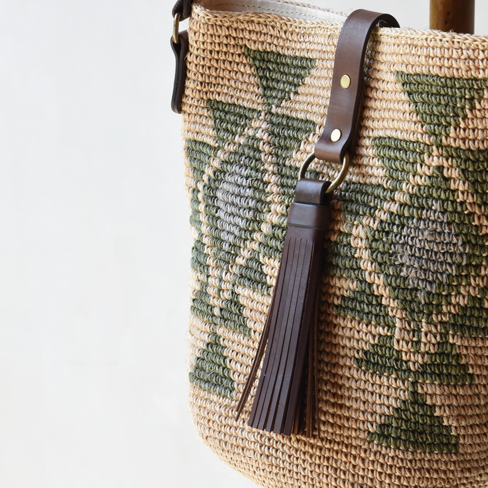Agave straw handwoven bag with leather straps.