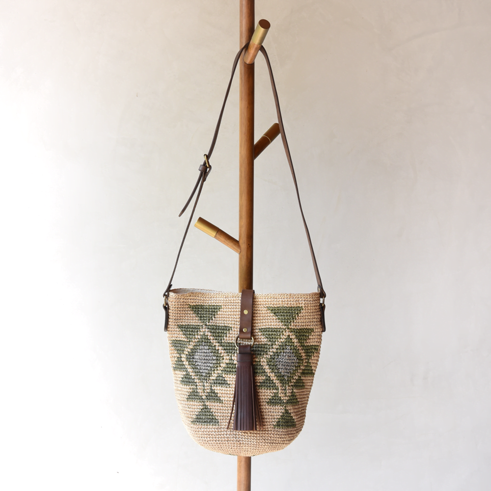 Agave straw handwoven bag with leather straps.